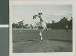 A Baseball Player from Ibaraki Christian College Pitching the Ball, Ibaraki, Japan, 1953