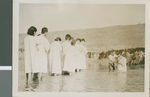 Baptizing twenty Koreans in the river, Seoul, Korea, 1954