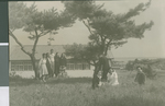 Students Outside of the First Classroom Building of Ibaraki Christian College Taking Photographs, Ibaraki, Japan, ca.1948-1952