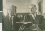 E. W. McMillan and Shoichi Oka Sharing a Hymnal, Ibaraki, Japan, ca.1948-1952