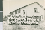 Ibaraki Christian College Students in front of the First Classroom Building at Ibaraki Christian College, Ibaraki, Japan, ca.1948-1955