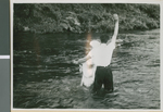 Harry R. Fox Baptizing a Young War Widow, Ibaraki, Japan, 1953